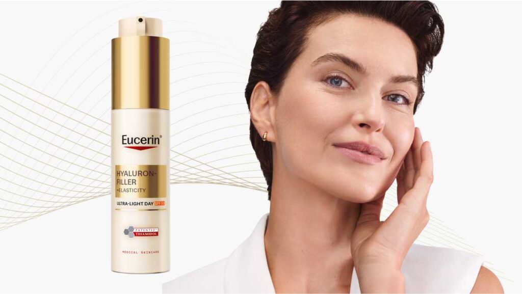 Eucerin Hyaluron-Filler i žena koja pokazuje čisto lice.